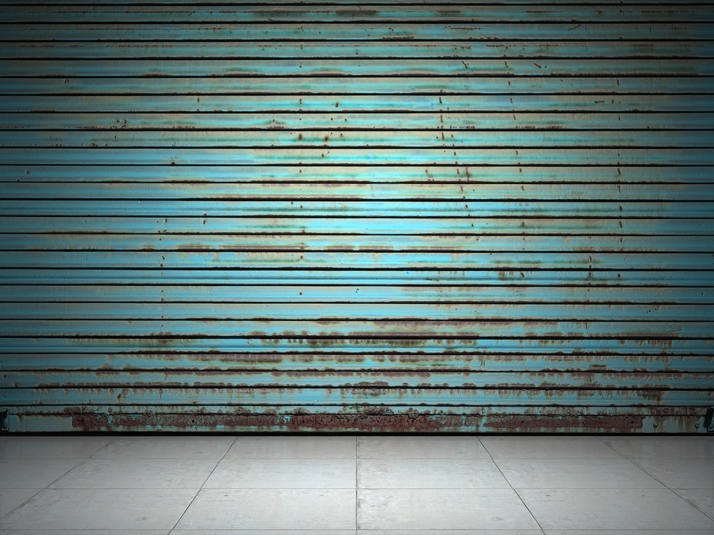old and rusty roll-up garage door