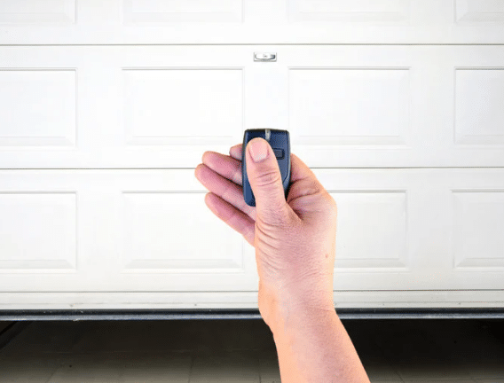 Operating the garage door opener using a remote.