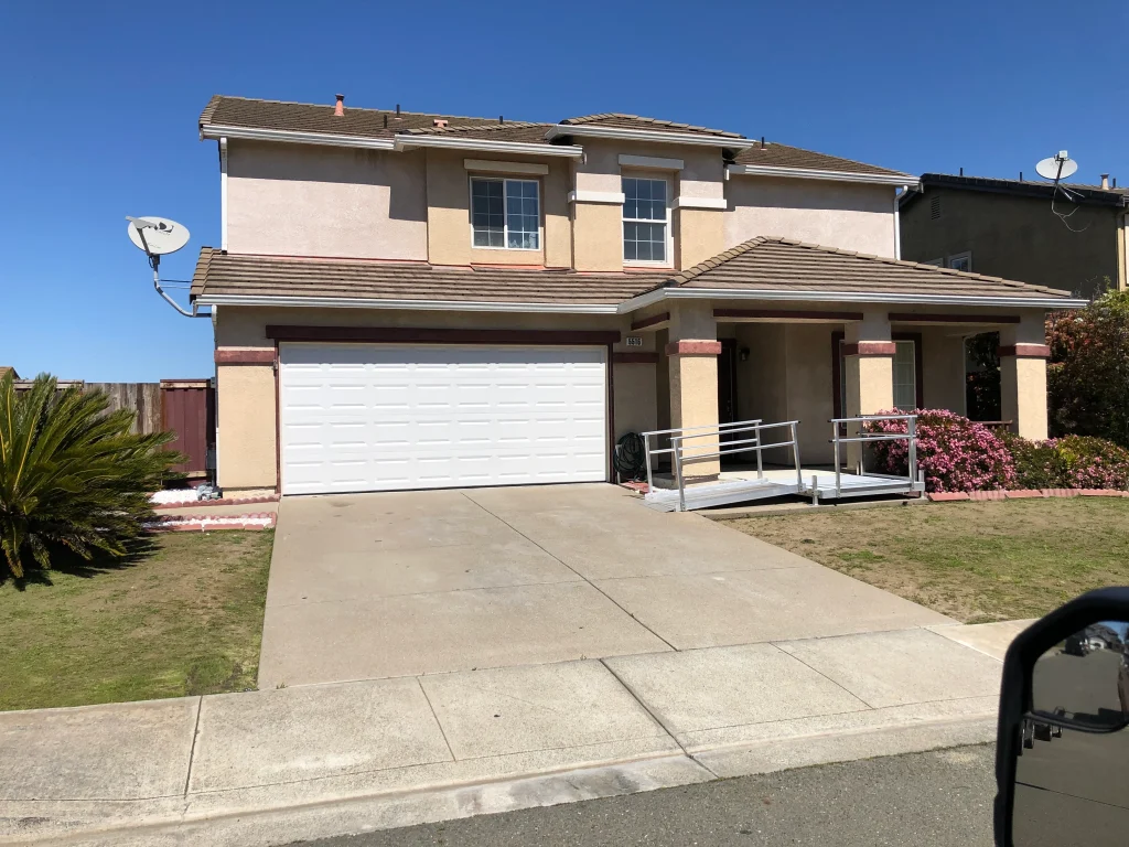 the enhanced security, insulation, and curb appeal that represent the top 7 reasons why a sectional overhead door is worth it