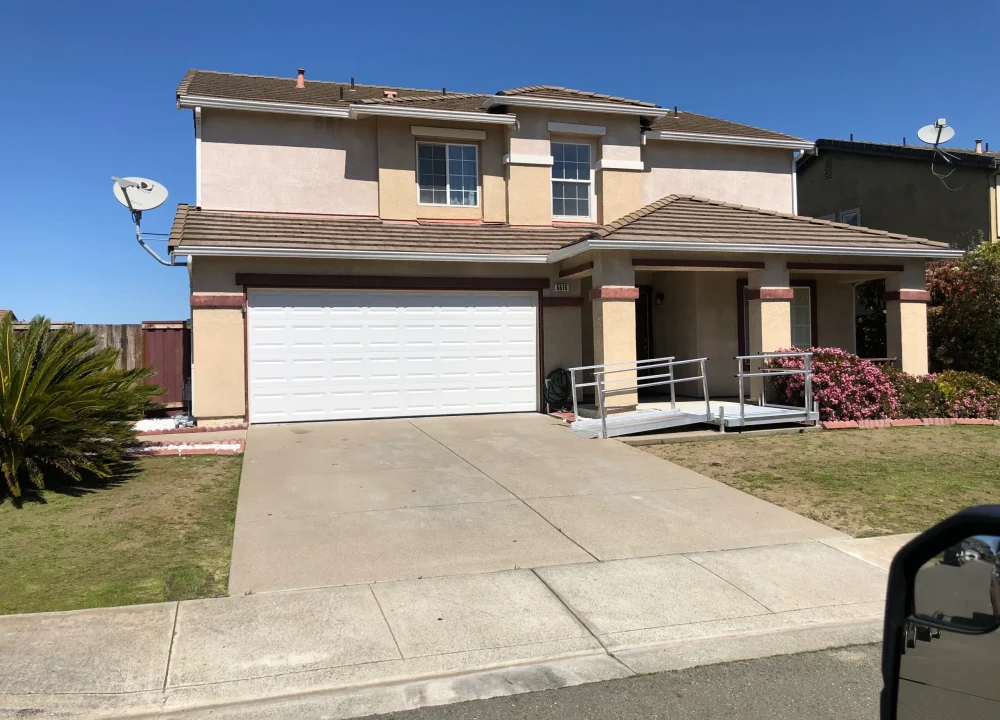 the enhanced security, insulation, and curb appeal that represent the top 7 reasons why a sectional overhead door is worth it