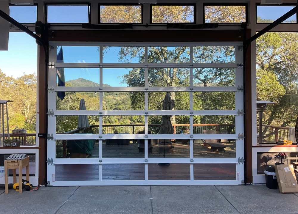 the modern curb appeal and natural light benefits of selecting a sectional overhead door for your home